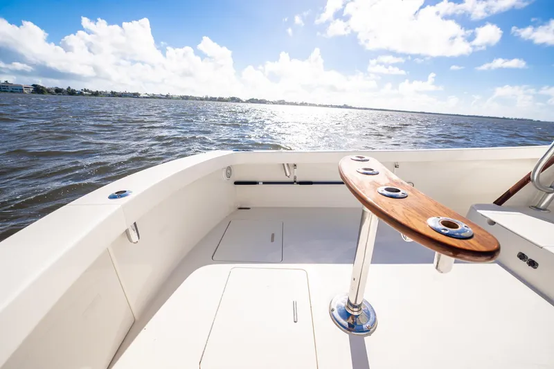 Reese Lee Yacht Photos Pics 2003 Gamefisherman 34 Express boat deck with ocean view, sunny day, clear skies.