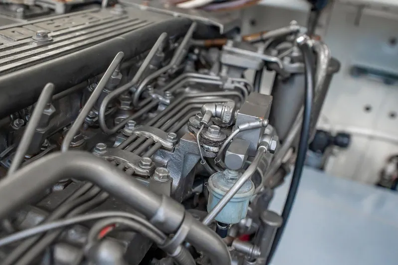 Reese Lee Yacht Photos Pics Engine components of a 2003 Gamefisherman 34 Express boat, showcasing intricate mechanical details.