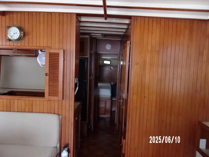 Chesapeake Yacht Photos Pics Interior of 1986 Kadey-Krogen Manatee 36 with wooden paneling and nautical decor.